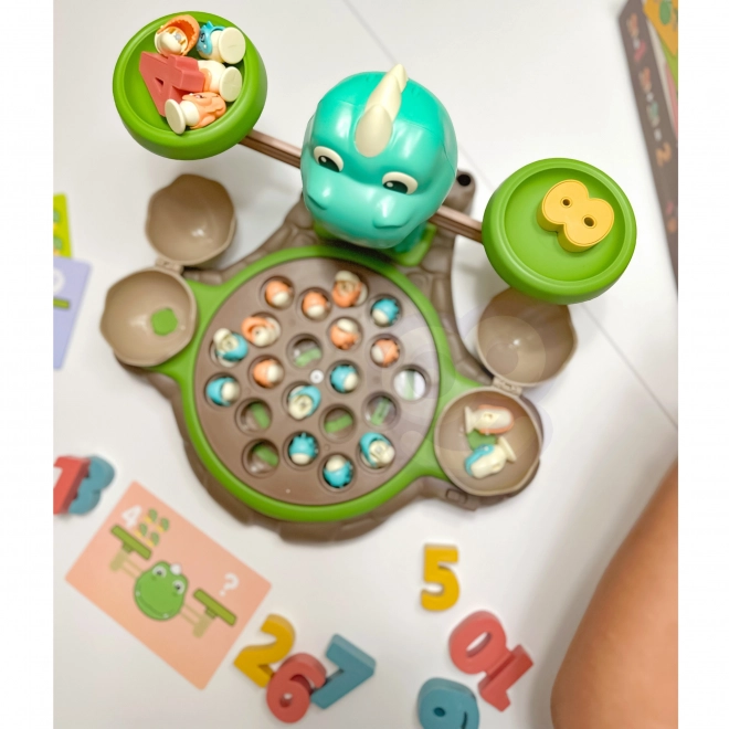 Gioco educativo Dinozaur con bilancia e cattura di WOOPIE