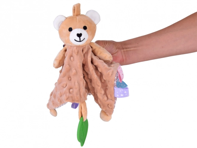 Elefantino di peluche con etichette e massaggiagengive