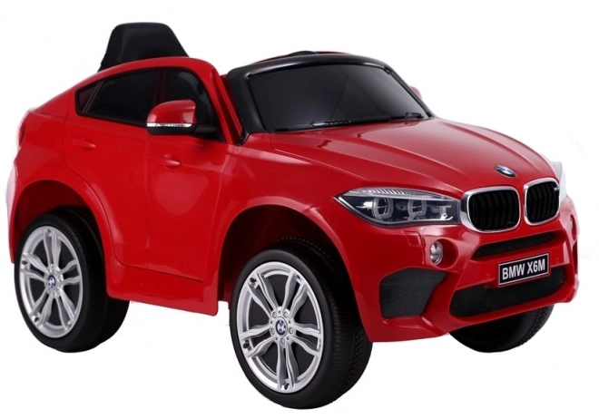 Macchina a Batteria BMW X6 Rossa in Pelle e Ruote EVA