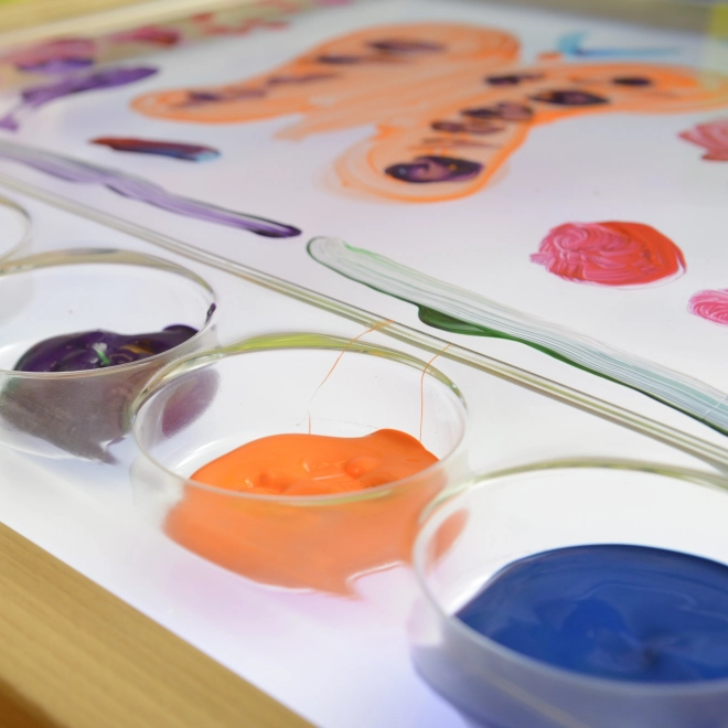 Cornice sensoriale Masterkidz con pannello LED e vassoio trasparente da disegno