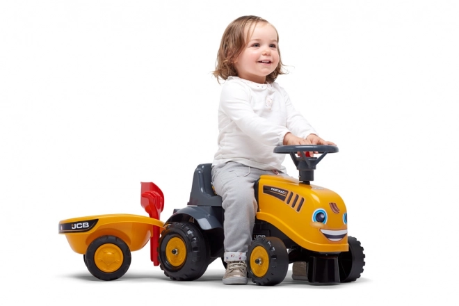 Odrážedlo Baby JCB giallo con rimorchio e pala