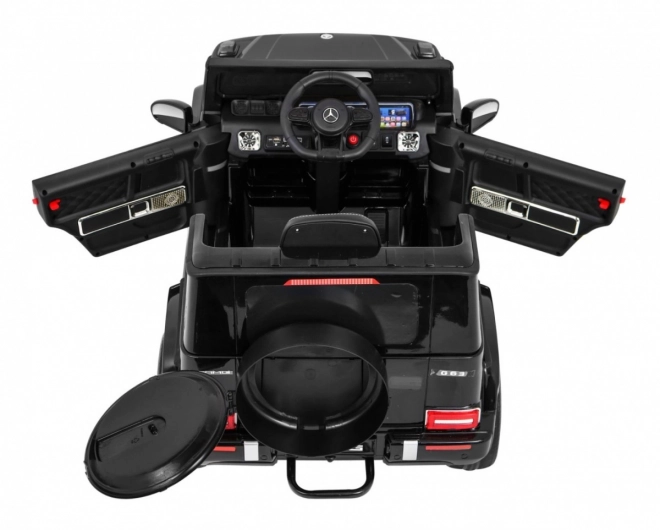 Mercedes AMG G63 per bambini Laccato nero + telecomando + MP3 LED + partenza lenta + EVA + cinture