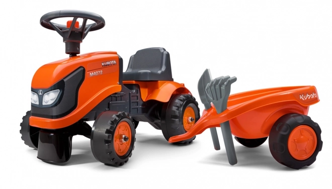 Trattore a pedali per bambini Kubota con rimorchio e accessori