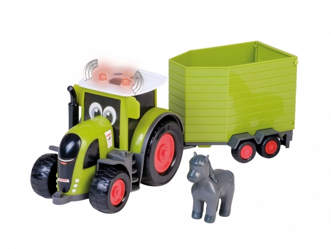 Trattore Claas con rimorchio per cavallo Happy People