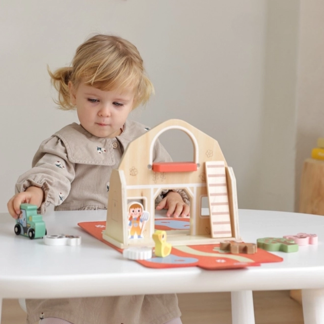 Fattoria impilabile in legno Tooky Toy con figurine di animali