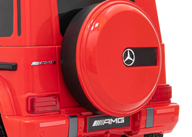 Mercedes AMG G63 per bambini Rosso + telecomando + MP3 LED + avvio lento + EVA + cinture