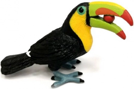 Figura tucano gigante con frutta