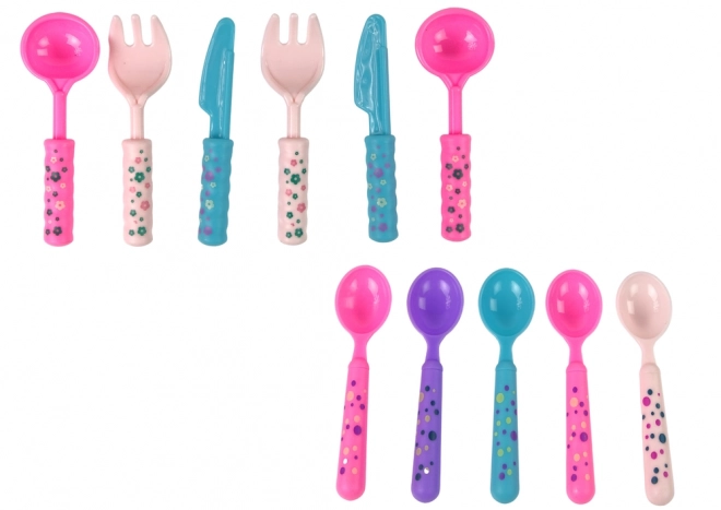 Set da tè per bambini con tazze, piatti e posate viola