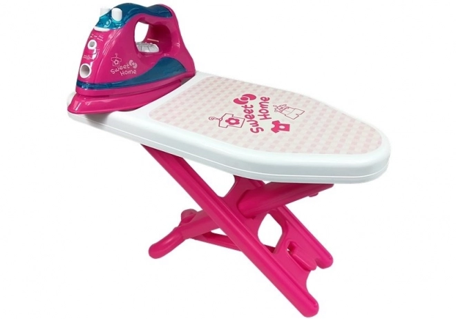 Set da stiro rosa con ferro da stiro e appendini