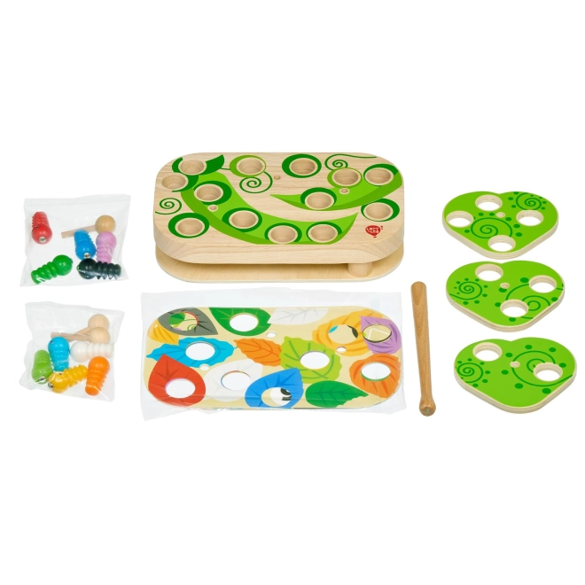 Bacchetta magnetica e bruchi in legno