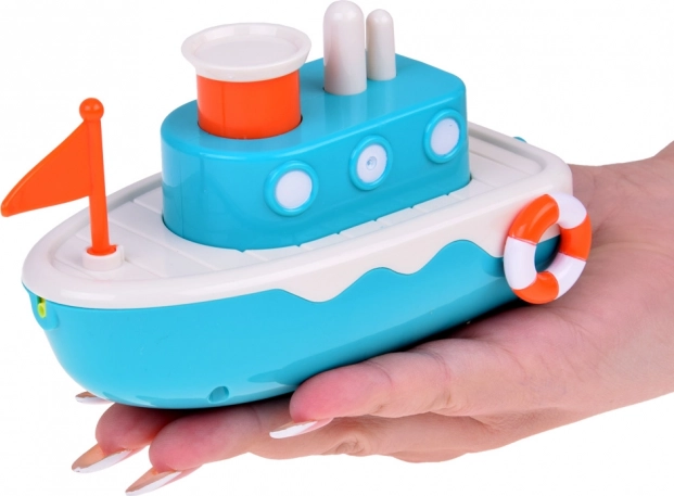 Barca galleggiante per bambini con fontana d'acqua