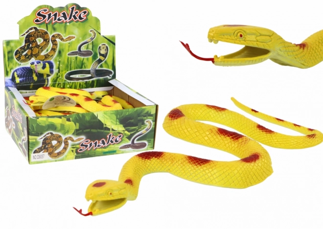 Serpente di gomma giallo con macchie rosse