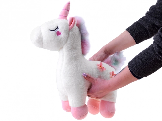 Unicorno di peluche magico