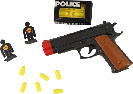 Pistola della polizia con bersagli e proiettili morbidi
