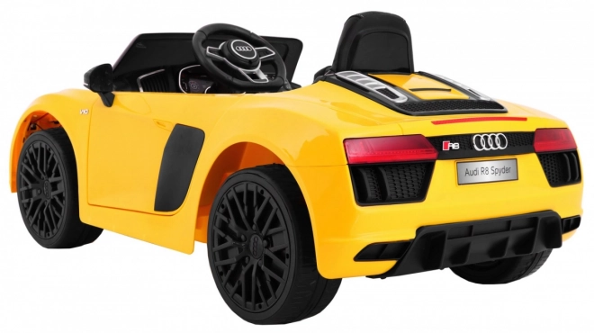 Audi R8 Spyder pacco batteria Giallo + Telecomando + EVA + Avvio lento + Radio MP3 + LED