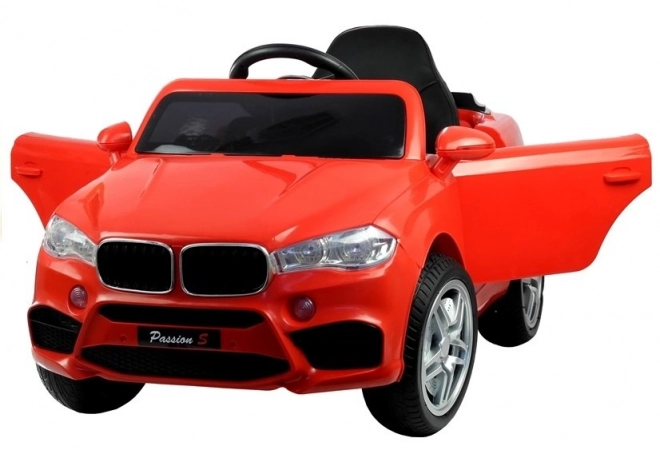 Auto elettrico rosso per bambini