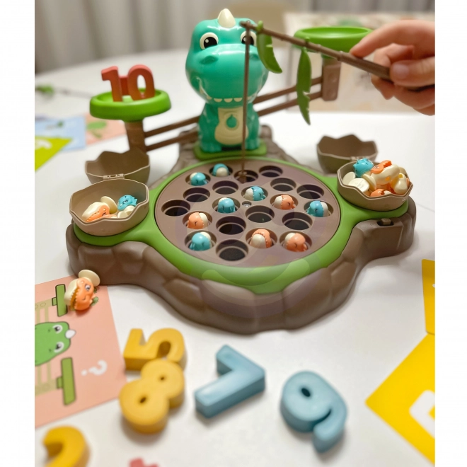 Gioco educativo Dinozaur con bilancia e cattura di WOOPIE
