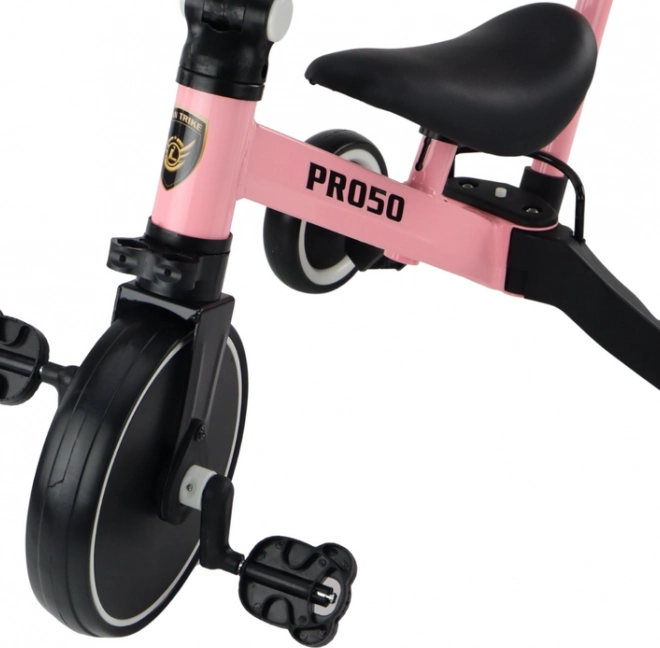 Triciclo con manico rosa