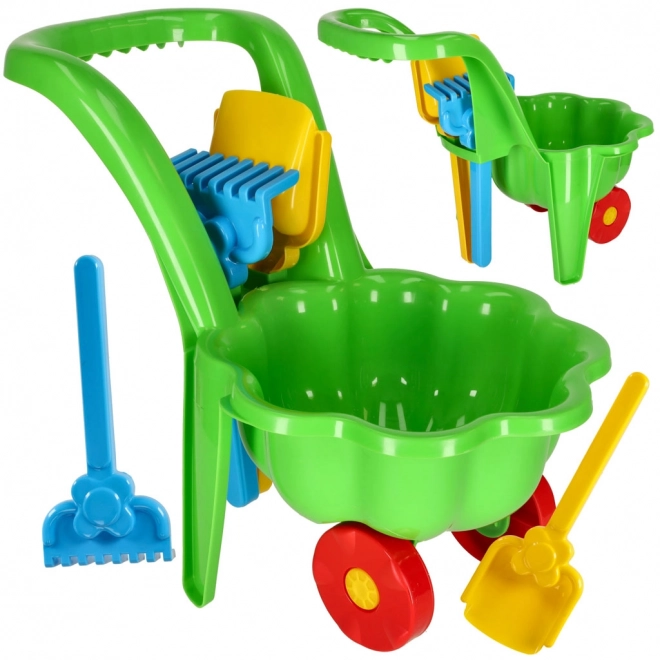 Carriola verde per bambini con set da giardino