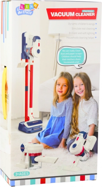 Set da pulizia per bambini con aspirapolvere bianco in piedi