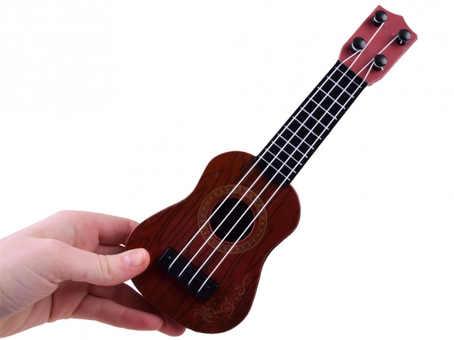 Mini chitarra ukulele per bambini