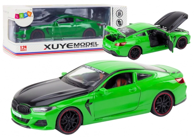 Auto sportiva verde in metallo con elementi apribili 1:24