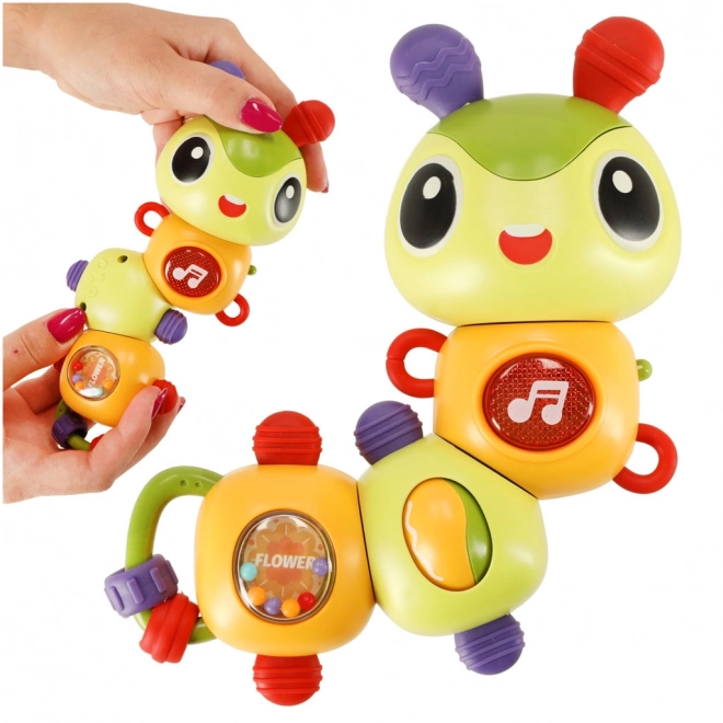 Giocattolo musicale in forma di bruco elettronico con luci
