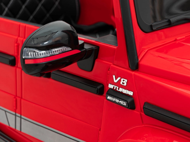 Mercedes AMG G63 per bambini Rosso + telecomando + MP3 LED + avvio lento + EVA + cinture