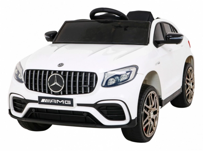 Mercedes Benz GLC63S per bambini bianco + telecomando + trazione 4x4 + MP3 LED + EVA + avvio lento