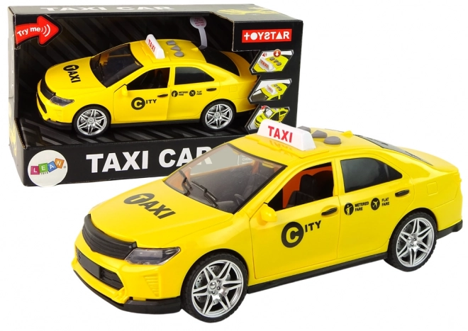 Taxi giocattolo con luci e suoni giallo