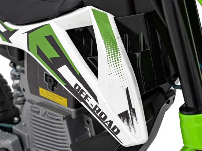 Moto verde per bambini a batteria con pannello audio e ruote in EVA