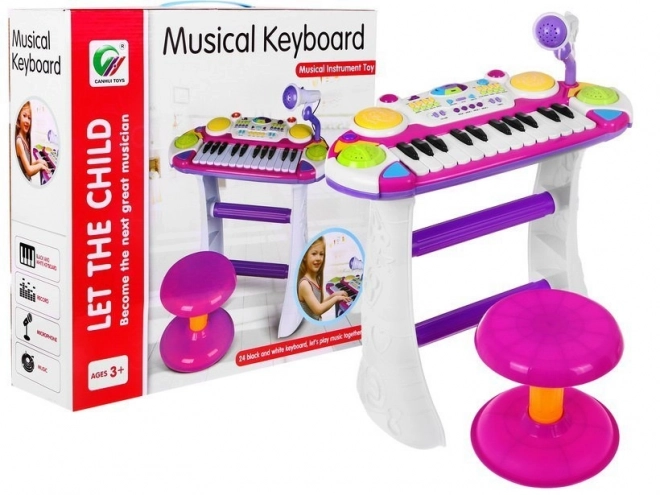 Set rosa musicale tastiera e tamburi con microfono per bambini 3+ con luci e suoni