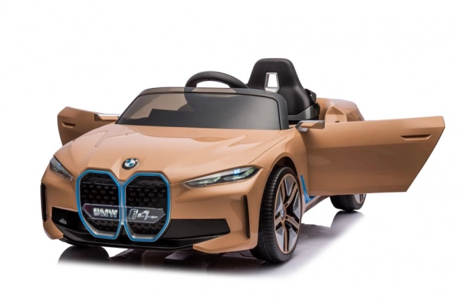 Auto a batteria BMW I4 dorato 4x4