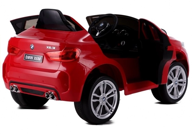 Macchina a Batteria BMW X6 Rossa in Pelle e Ruote EVA