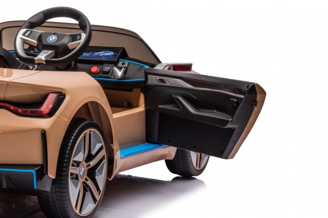 Auto a batteria BMW I4 dorato 4x4