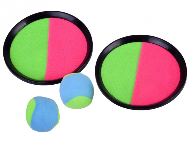 Gioco con racchette e palline di velcro
