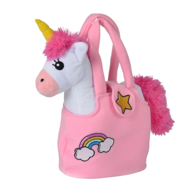 Unicorno di peluche nella borsa