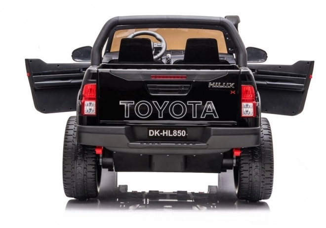 Auto elettrico per bambini Toyota Hilux bianco – Nera