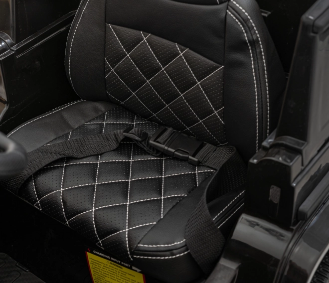 Mercedes AMG G63 per bambini nero + telecomando + MP3 LED + partenza lenta + EVA + cinture di sicurezza