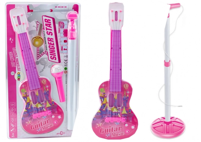 Chitarra elettrica rosa con microfono e supporto