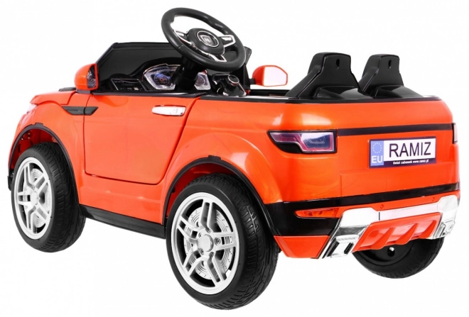 Macchinina elettrica sportiva Rapid Racer arancione