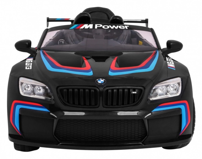 BMW M6 GT3 Auto a batteria per bambini nero + ventilazione + suoni MP3 Luci + telecomando