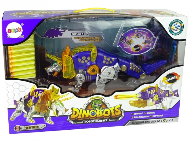 Triceratopo Dinobot Viola 2 in 1 con Pistola a Freccette e Bersaglio