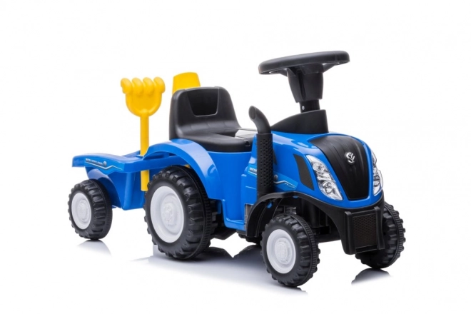 Trattore cavalcabile New Holland blu