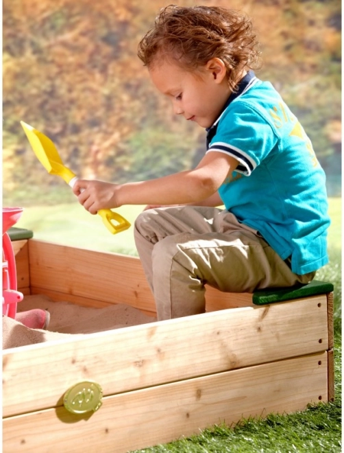 Sandbox in legno AXI con spazio di stivaggio e telone