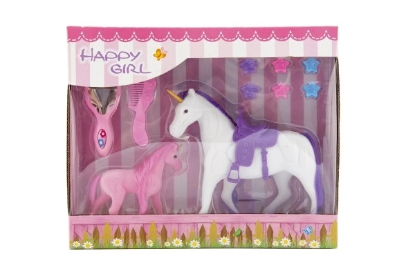 Unicorno con sella e puledro in plastica con accessori