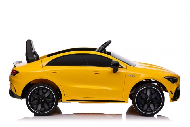 Auto elettrico per bambini Mercedes CLA 45s AMG giallo 4x4