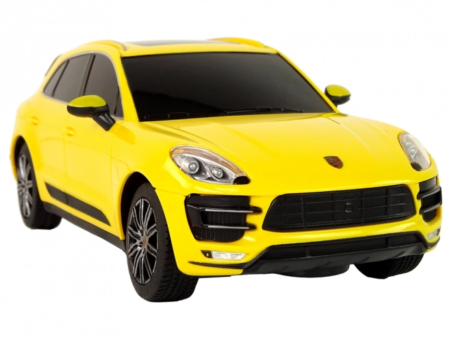 Auto radiocomandata Porsche Macan Turbo gialla 1:24