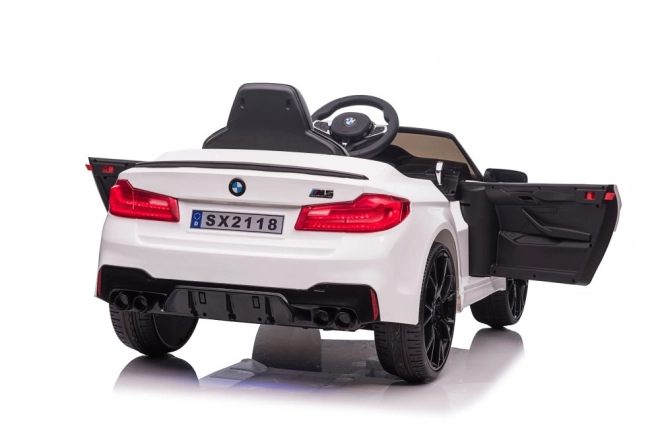 Veicolo elettrico per bambini BMW M5 bianco