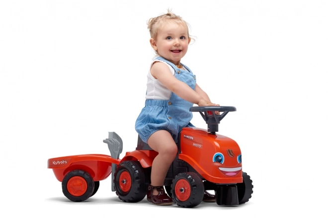 Trattore a pedali per bambini Kubota con rimorchio e accessori